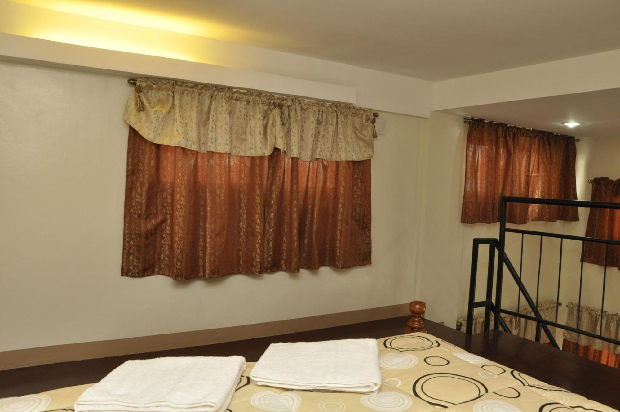 Pal-Watson Apartments Мактан Номер фото